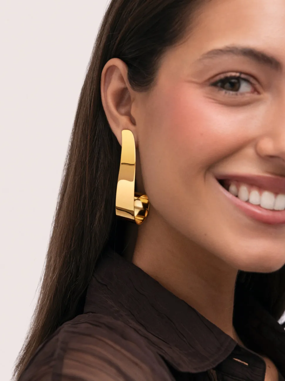 Pendientes Long Caracola Acero Baño Oro