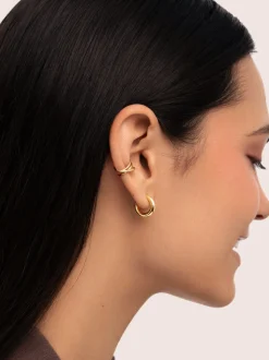 Pendiente Suelto Ear Cuff Triple Cross Baño Oro